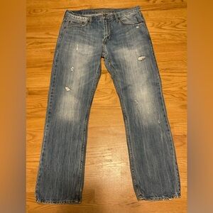 Men's American Eagle Outfitters Blue Distressed Faded Original Straight Jeans.